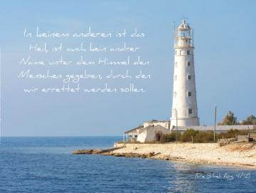 Leinwanddruck Weißer Leuchtturm mit Nebengebäuden
